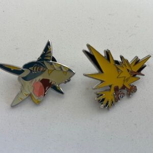 Pokemon Zapdos and Mega Sharkpedo Official Enamel Pins